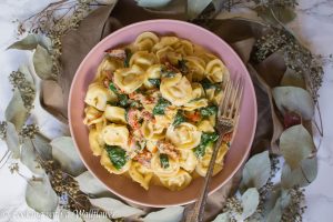 Creamy Sun Dried Tomato Spinach Tortellini Cooking With A Wallflower