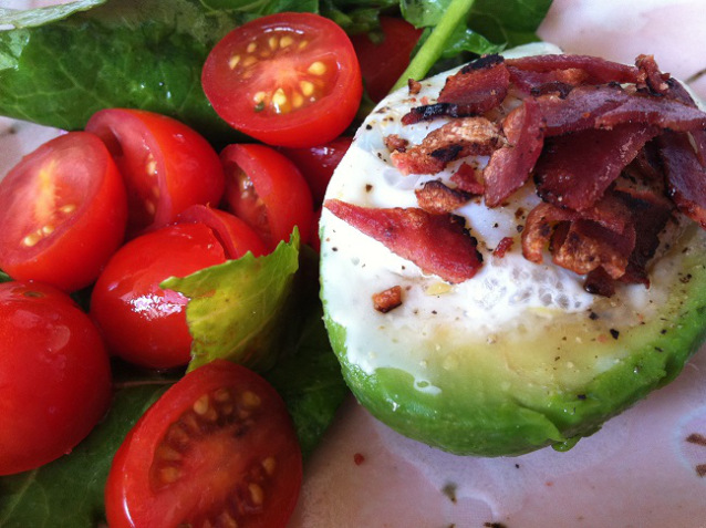 Egg in an Avocado Topped with Turkey Bacon