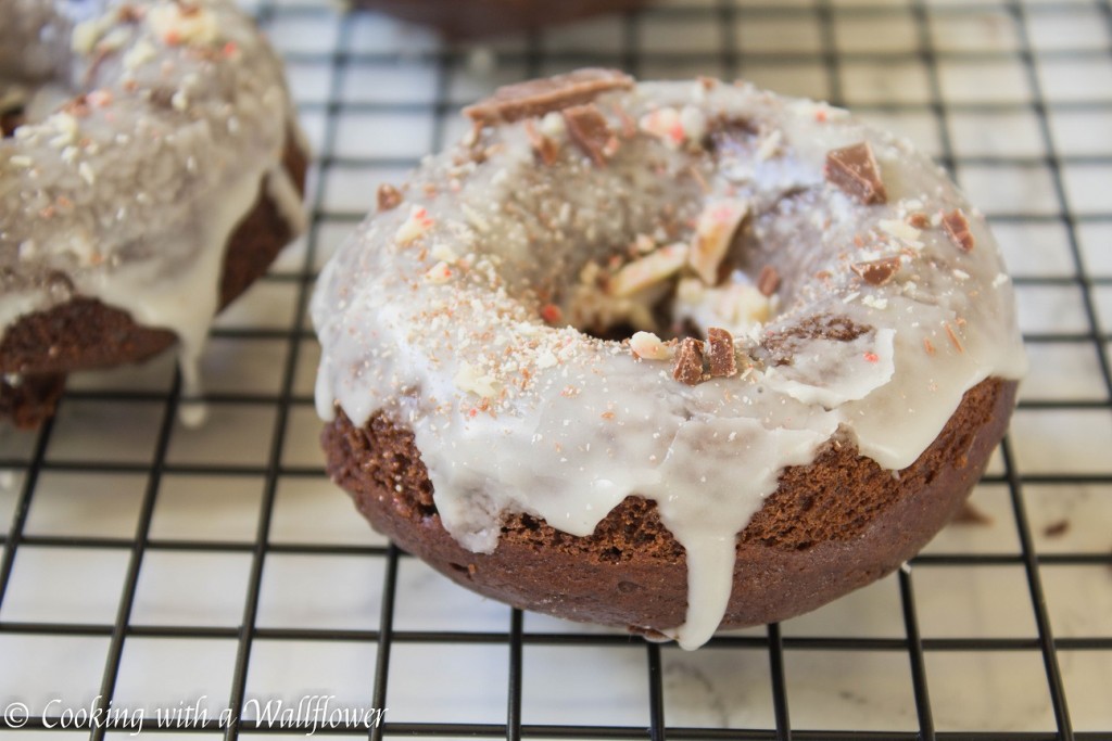 Glazed Chocolate Cake Doughnuts with Peppermint Bark | Cooking with a Wallflower
